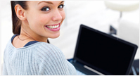 image smiling girl at laptop
